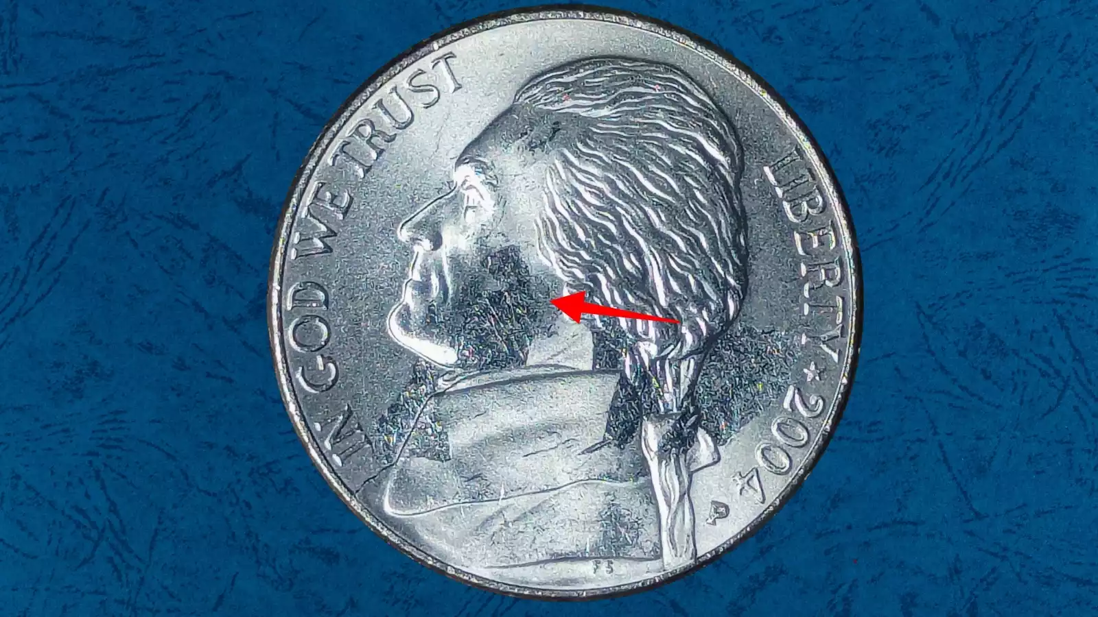 2004-P nickel improperly annealed planchet error showing copper-colored Black Beauty surface discoloration